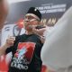 Sekretaris DPD PDIP Gorontalo, La Ode Haimudin saat diwawancarai awak media, Minggu (15/6/2025). (Foto : Sucipto Mokodompis/ Penagar.id)