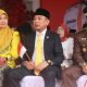 Ghalib Lahidjun mewakili Ketua DPRD Provinsi Gorontalo menghadiri upacara penurunan bendera merah putih di halaman Rumah Jabatan Gubernur Gorontalo, Minggu (17/8/2025). (Foto : Dok. Humas DPRD)
