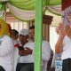 Bupati Gorontalo Utara, Thariq Modanggu bersama Wakil Bupati Nurjanah Yusuf  dalam kegiatan pencanangan kegiatan  HUT  RI pada Selasa (5/8/2025). (Foto : Dok Humas)