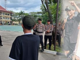 Zakaria menggelar aksi tunggal di depan Polda Gorontalo, Selasa (5/5/2026)./Penagar.id